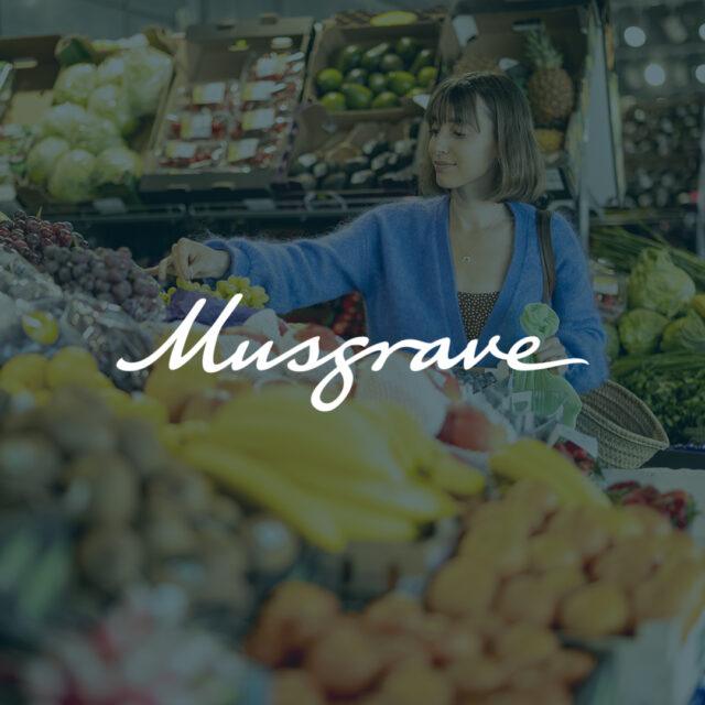 Musgrave logo over an image of a person in a grocery store buying fruit and vegetables