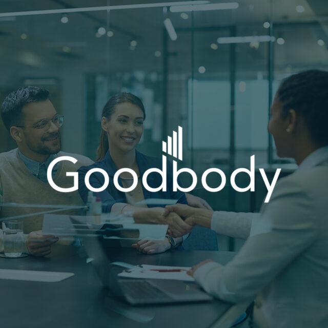 GoodBody logo over people shaking hands in an office