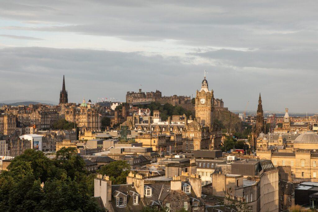 Historic stunning cityscape of Edinburgh under the sunlight on a cloudy day