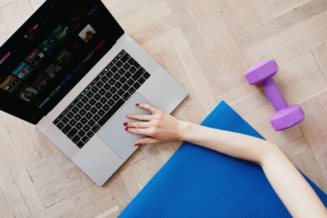 laptop with fitness equipment