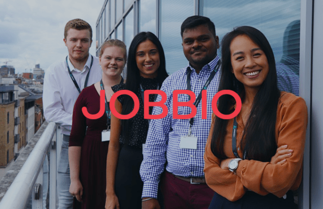 Group of people smiling and JOBBIO logo