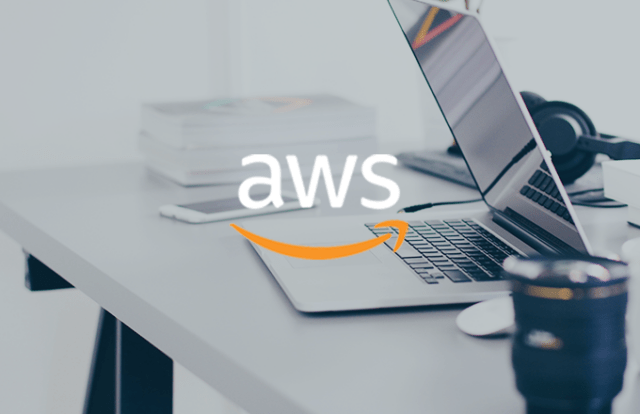 AWS logo over laptop image