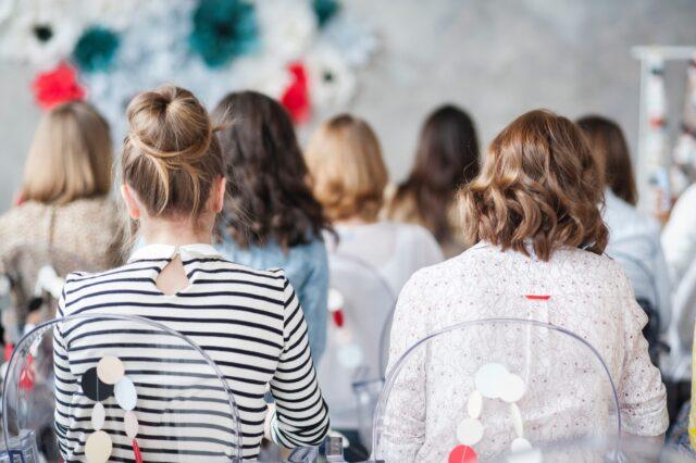 group of women watching a presentation