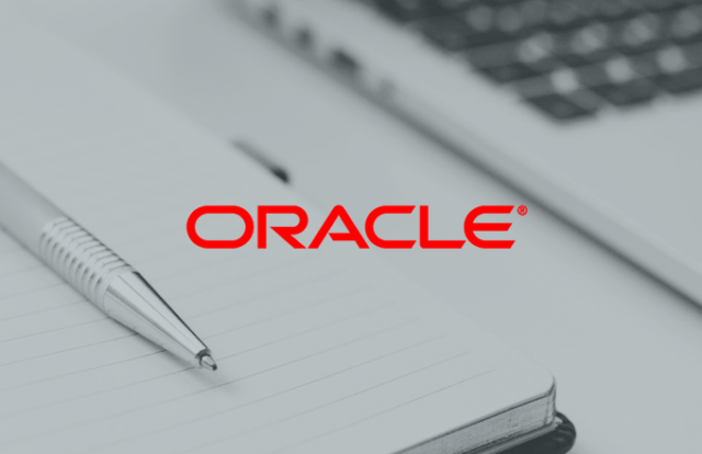 Pen and notepad with Oracle logo